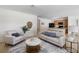 Spacious living room with neutral decor and ample natural light at 2200 Pratt Avenue, North Port, FL 34286