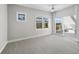 Bright, airy bedroom with large windows and sliding glass doors to the balcony at 2550 Harbourside Dr # 322, Longboat Key, FL 34228