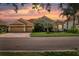 Beautiful home with tile roof and landscaped yard at 2773 Harvest Dr, Sarasota, FL 34240