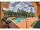 Relaxing pool and spa with covered lanai at 2773 Harvest Dr, Sarasota, FL 34240