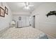 Bedroom with a double bed, dresser, and ceiling fan at 2820 Greenbriar St, Sarasota, FL 34237