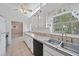 Bright kitchen with ample counter space and white cabinetry at 2820 Greenbriar St, Sarasota, FL 34237