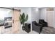 Finished basement with a sitting area and access to bedroom at 2826 Marlette St, Sarasota, FL 34231