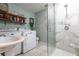 Clean bathroom with walk-in shower and white tile at 2826 Marlette St, Sarasota, FL 34231