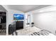 Cozy bedroom with TV, dresser, and ample closet space at 2826 Marlette St, Sarasota, FL 34231