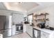 Modern kitchen with stainless steel appliances and white cabinets at 2826 Marlette St, Sarasota, FL 34231