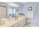 Light and airy bathroom with a vanity and shower/tub combo at 308 Matisse E Cir, Nokomis, FL 34275