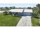 Attractive house exterior with new landscaping and driveway at 308 Matisse E Cir, Nokomis, FL 34275