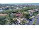 Aerial image showcases a community with beautiful landscaping, canals, and waterfront homes at 3131 Bayou Sound, Longboat Key, FL 34228