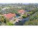 Overhead view of waterfront homes each with pool, lanai and private boat dock on canals at 3131 Bayou Sound, Longboat Key, FL 34228