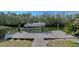 A private boat dock featuring a boat lift, offering waterfront access and recreational opportunities at 3131 Bayou Sound, Longboat Key, FL 34228