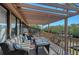 Relax on this spacious deck with comfortable seating and serene waterfront views at 3131 Bayou Sound, Longboat Key, FL 34228