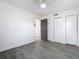 Spacious bedroom with ample closet space and grey tile floors at 3419 27Th Pkwy, Sarasota, FL 34235