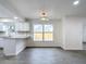 Bright kitchen with white cabinets, granite countertops, and stainless steel appliances at 3419 27Th Pkwy, Sarasota, FL 34235