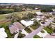 Wide aerial view showing home, golf course and neighborhood at 3746 Torrey Pines Blvd, Sarasota, FL 34238