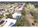 Aerial view of a luxury home community with golf course and pool at 3746 Torrey Pines Blvd, Sarasota, FL 34238
