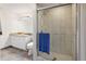 Bathroom with a walk-in shower and updated fixtures at 3746 Torrey Pines Blvd, Sarasota, FL 34238