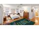 Spacious bedroom with a king-size bed and built-in cabinets at 3746 Torrey Pines Blvd, Sarasota, FL 34238