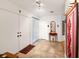 Bright and airy entryway with tiled floors and a cozy rug at 3746 Torrey Pines Blvd, Sarasota, FL 34238