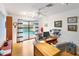 Home office with pool view and a large work desk at 3746 Torrey Pines Blvd, Sarasota, FL 34238