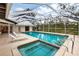 Large screened pool with spa and patio area at 3746 Torrey Pines Blvd, Sarasota, FL 34238