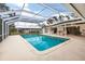 Screened pool and spa with spacious patio at 3746 Torrey Pines Blvd, Sarasota, FL 34238