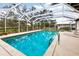 Relaxing screened pool with ample deck space at 3746 Torrey Pines Blvd, Sarasota, FL 34238