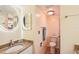 Clean bathroom with granite countertop and a shower at 404 Cerromar N Cir # 108, Venice, FL 34293