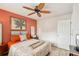 Bedroom with ceiling fan and neutral decor at 404 Cerromar N Cir # 108, Venice, FL 34293