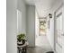 Bright hallway with tiled floors and access to outdoor patio at 404 Cerromar N Cir # 108, Venice, FL 34293