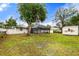 Spacious backyard with shed and screened patio at 4042 Radnor Pl, Sarasota, FL 34233