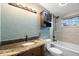 Spa-like bathroom with granite countertop and updated vanity at 4042 Radnor Pl, Sarasota, FL 34233