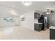 Open floor plan with modern kitchen and spacious living area at 4042 Radnor Pl, Sarasota, FL 34233