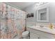 Bathroom with nautical-themed shower curtain at 4363 Melis St, Port Charlotte, FL 33948