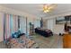 Well-lit bedroom featuring two beds and sliding glass doors at 4363 Melis St, Port Charlotte, FL 33948