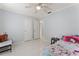 Bedroom with a single bed and ceiling fan at 4363 Melis St, Port Charlotte, FL 33948