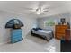 Bedroom with a double bed, dresser, and ceiling fan at 4363 Melis St, Port Charlotte, FL 33948