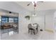 Kitchen dining area with table and chairs, view to living room at 4363 Melis St, Port Charlotte, FL 33948