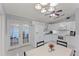 Bright kitchen with white cabinets, granite counters and French doors at 4363 Melis St, Port Charlotte, FL 33948