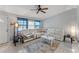 Living Room with white sectional sofa and ceiling fan at 4363 Melis St, Port Charlotte, FL 33948