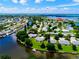 Wide aerial view of waterfront community, showcasing numerous homes and waterways at 4799 Independence Dr, Bradenton, FL 34210