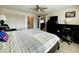 Main bedroom with king-size bed, desk, and large closet at 4799 Independence Dr, Bradenton, FL 34210