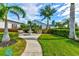 Relaxing patio area with fountain and benches at 4799 Independence Dr, Bradenton, FL 34210