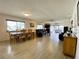 Open living and dining area with light floors and comfortable furniture at 4799 Independence Dr, Bradenton, FL 34210