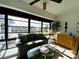 Bright sunroom, offering water views and comfortable seating at 4799 Independence Dr, Bradenton, FL 34210