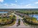 Aerial view of community entrance and surrounding homes at 491 Casalino Dr, Nokomis, FL 34275