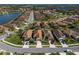 Aerial view of a residential neighborhood showing a single-Gathering home at 491 Casalino Dr, Nokomis, FL 34275
