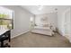 Comfortable bedroom with a king-size bed and plenty of natural light at 491 Casalino Dr, Nokomis, FL 34275