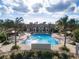 Community pool with surrounding lounge area at 491 Casalino Dr, Nokomis, FL 34275