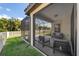 Side view of a screened patio and backyard at 491 Casalino Dr, Nokomis, FL 34275